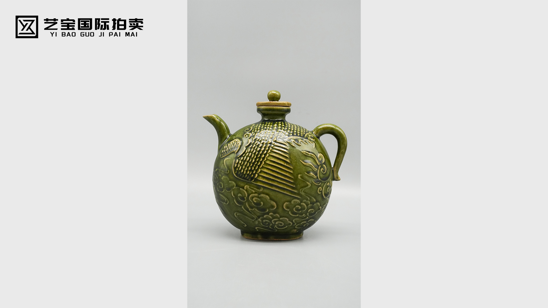 翠釉凝凤，古瓷藏韵——明前耀州窑绿釉堆塑凤首壶的工艺与价值