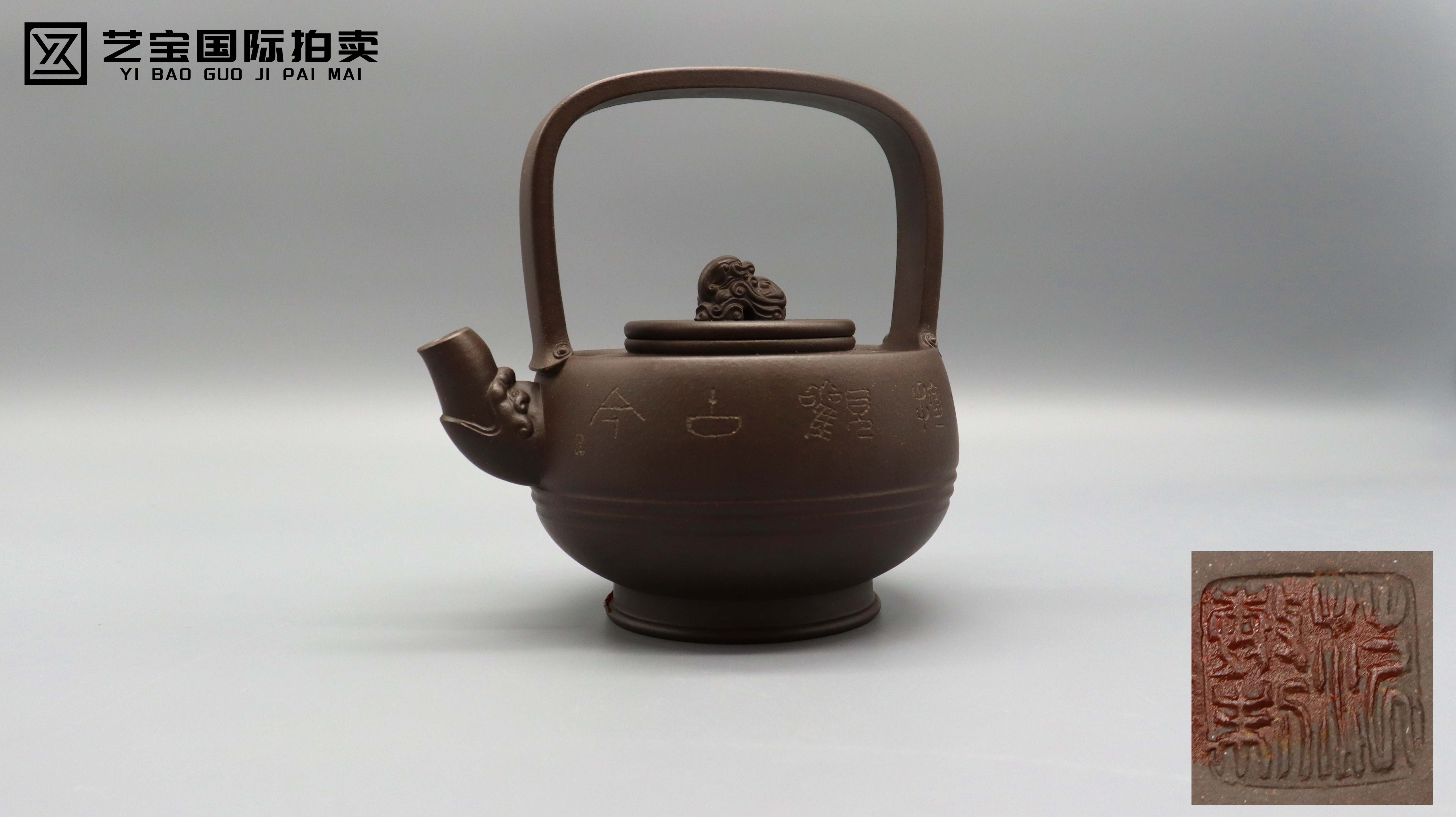 现代 范故 紫砂提梁壶 夜场.jpg